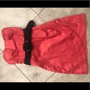 Strapless coral dress with attachable black belt